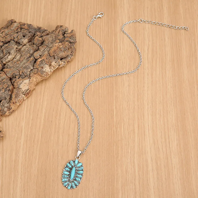 Turquoise Treasure: Statement Alloy Necklace with Vibrant Pendant